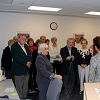 Attendees listen intently to tour leader, Nancy Kerns